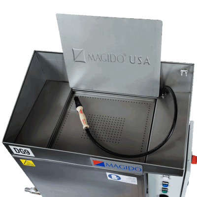 Top view DG9 Stainless steel sink style parts washer with a foot pedal regulated hand-held flow-through cleaning brush